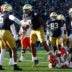 Notre Dame defensive lineman Jason Onye (47) celebrates tackling Syracuse running back Will Nixon (24) in the first half of a NCAA football game at Notre Dame Stadium on Saturday, Nov. 22, 2025, in South Bend.