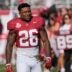 Nov 22, 2025; Tuscaloosa, Alabama, USA; Alabama running back Jam Miller (26) walks to his family with a rose in hand on Senior Day at Saban Field at Bryant-Denny Stadium.