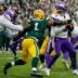 Green Bay Packers defensive end Micah Parsons (1) sacks Minnesota Vikings quarterback J.J. McCarthy (9) on Sunday, November 23, 2025, at Lambeau Field in Green Bay, Wis. The Packers won the game, 23-6.