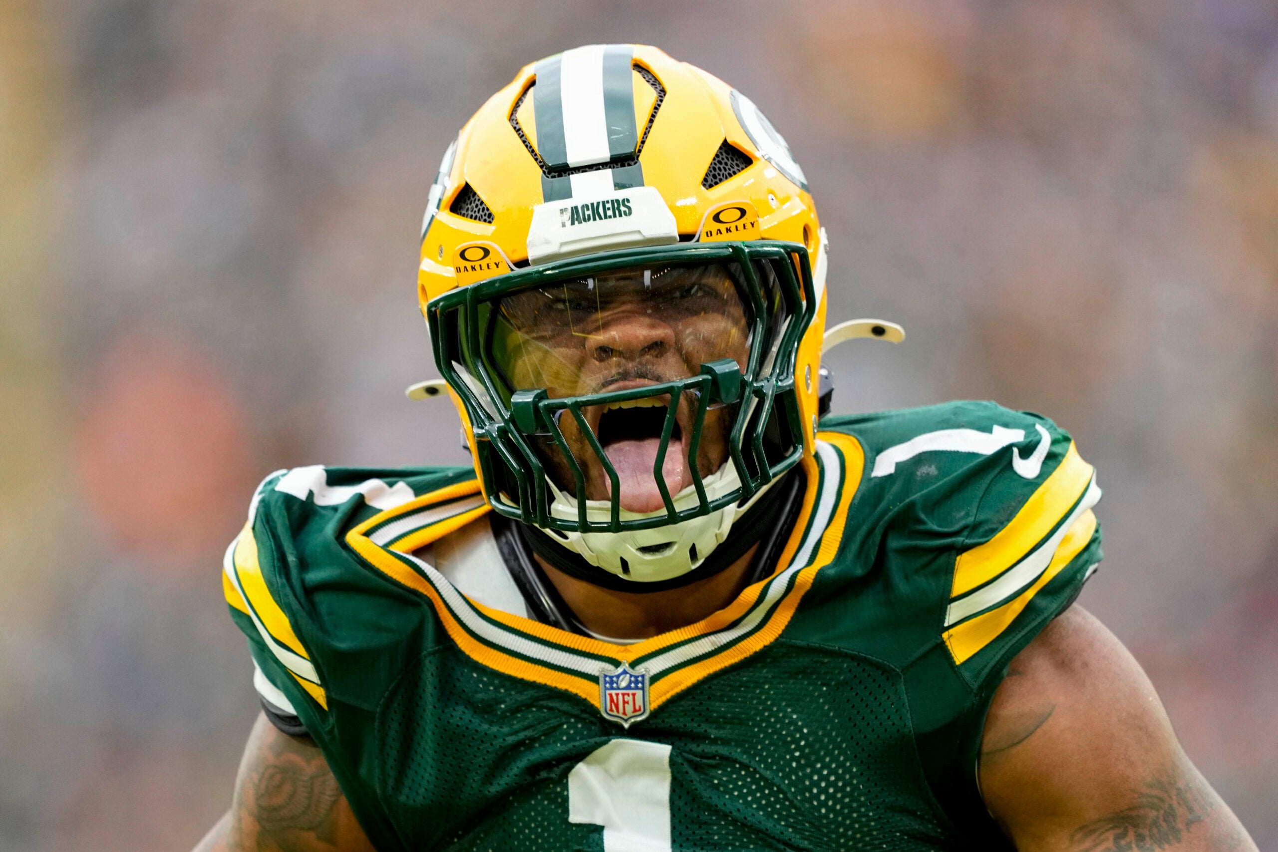 Nov 23, 2025; Green Bay, Wisconsin, USA; Green Bay Packers defensive end Micah Parsons (1) celebrates after sacking Minnesota Vikings quarterback J.J. McCarthy (9) (not pictured) during the game at Lambeau Field.