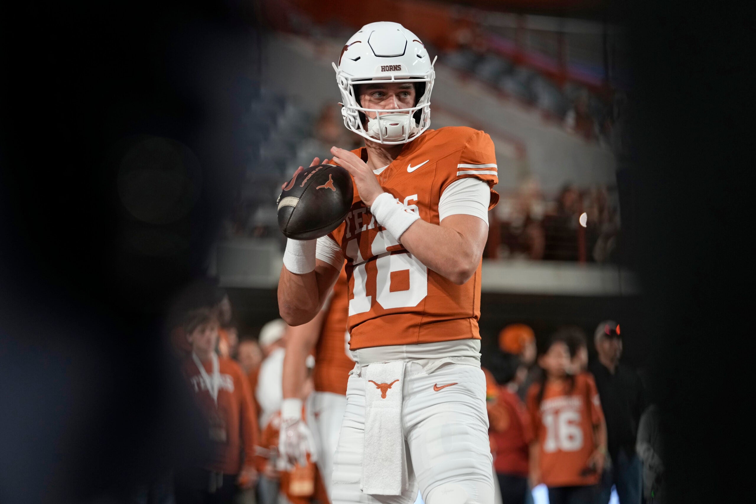 Nov 28, 2025; Austin, Texas, USA; Texas Longhorns quarterback Arch Manning warms up before a game against the Texas A&M Aggies at Darrell K Royal-Texas Memorial Stadium.