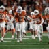 Nov 28, 2025; Austin, Texas, USA; Texas Longhorns defensive back Kobe Black (6) and teammates react after making an interception during the second half against the Texas A&M Aggies at Darrell K Royal-Texas Memorial Stadium.