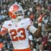 Clemson cornerback Ashton Hampton (23) blows a kiss to fans after a defensive interception score by cornerback Ricardo Jones (6) during the fourth quarter at Williams-Brice Stadium in Columbia, S.C. Saturday, November 29, 2025.