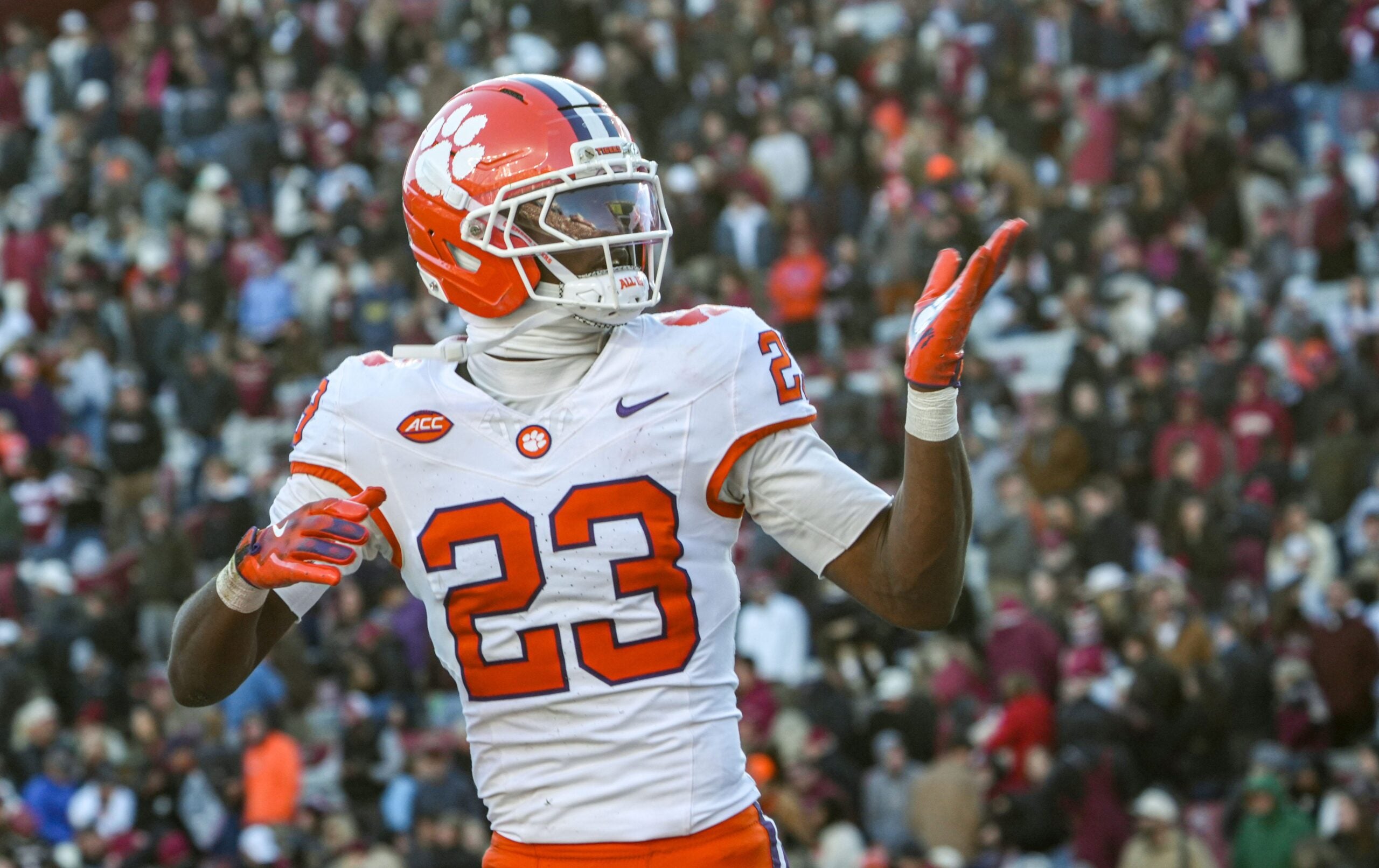 Clemson cornerback Ashton Hampton (23) blows a kiss to fans after a defensive interception score by cornerback Ricardo Jones (6) during the fourth quarter at Williams-Brice Stadium in Columbia, S.C. Saturday, November 29, 2025.