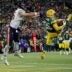 Green Bay Packers cornerback Keisean Nixon (25) intercepts a pass intended for Chicago Bears tight end Cole Kmet (85) in the end zone to seal a victory on Sunday, December 7, 2025, at Lambeau Field in Green Bay, Wis. The Packers won the game, 28-21.