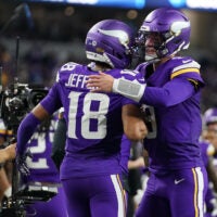 Dec 14, 2025; Arlington, Texas, USA; Minnesota Vikings wide receiver Justin Jefferson (18) celebrates with quarterback J.J. McCarthy (9) after a Vikings touchdown during the second half against the Dallas Cowboys at AT&T Stadium.