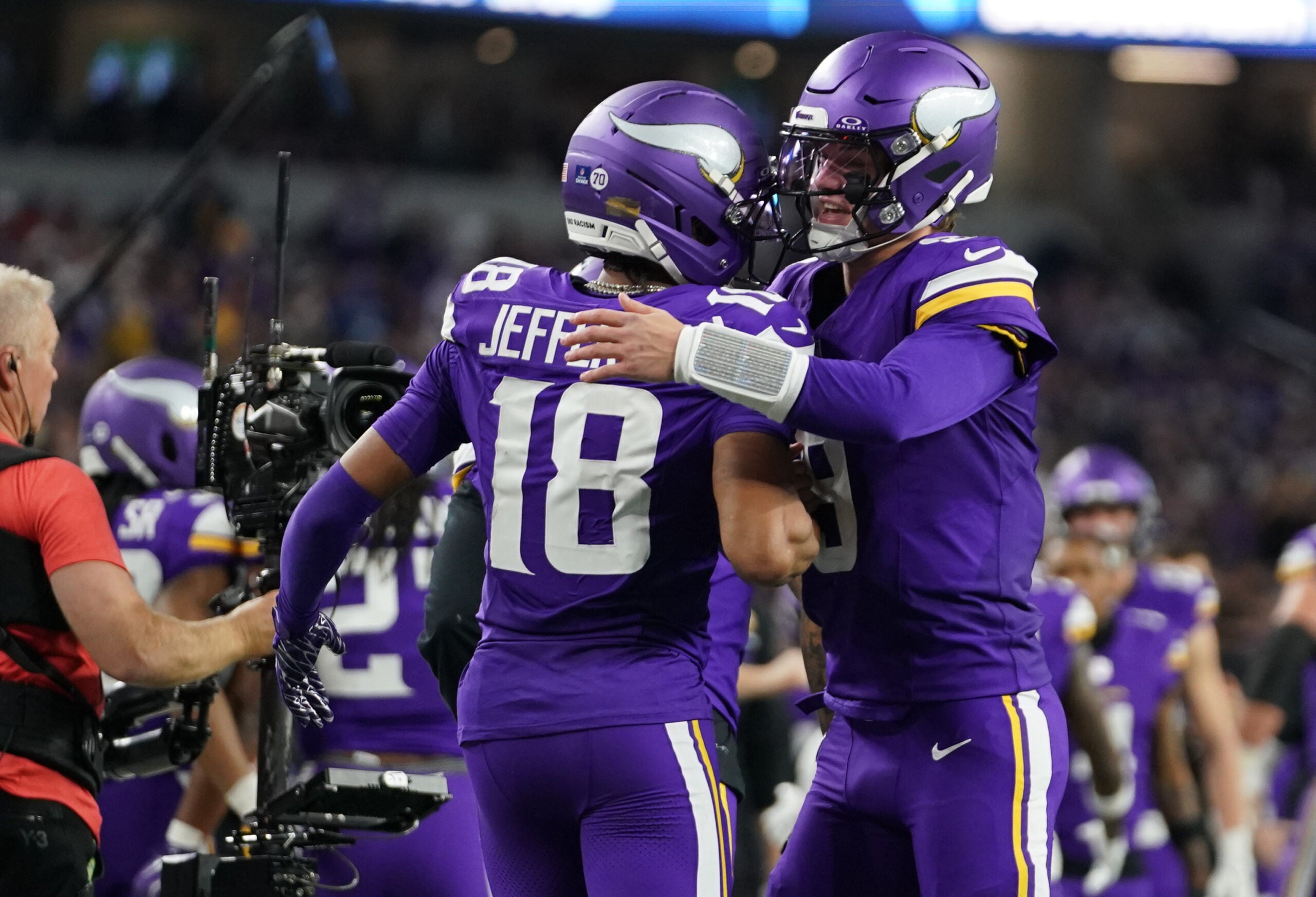 Dec 14, 2025; Arlington, Texas, USA; Minnesota Vikings wide receiver Justin Jefferson (18) celebrates with quarterback J.J. McCarthy (9) after a Vikings touchdown during the second half against the Dallas Cowboys at AT&T Stadium.