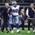 Dec 14, 2025; Arlington, Texas, USA; Dallas Cowboys defensive tackle Quinnen Williams (92) walks off the field with trainers after an injury during the second half against the Minnesota Vikings at AT&T Stadium.