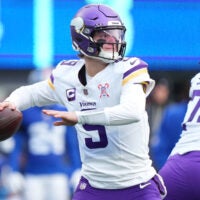 Dec 21, 2025; East Rutherford, New Jersey, USA; Minnesota Vikings quarterback J.J. McCarthy (9) drops back to pass against the New York Giants during the first half at MetLife Stadium.