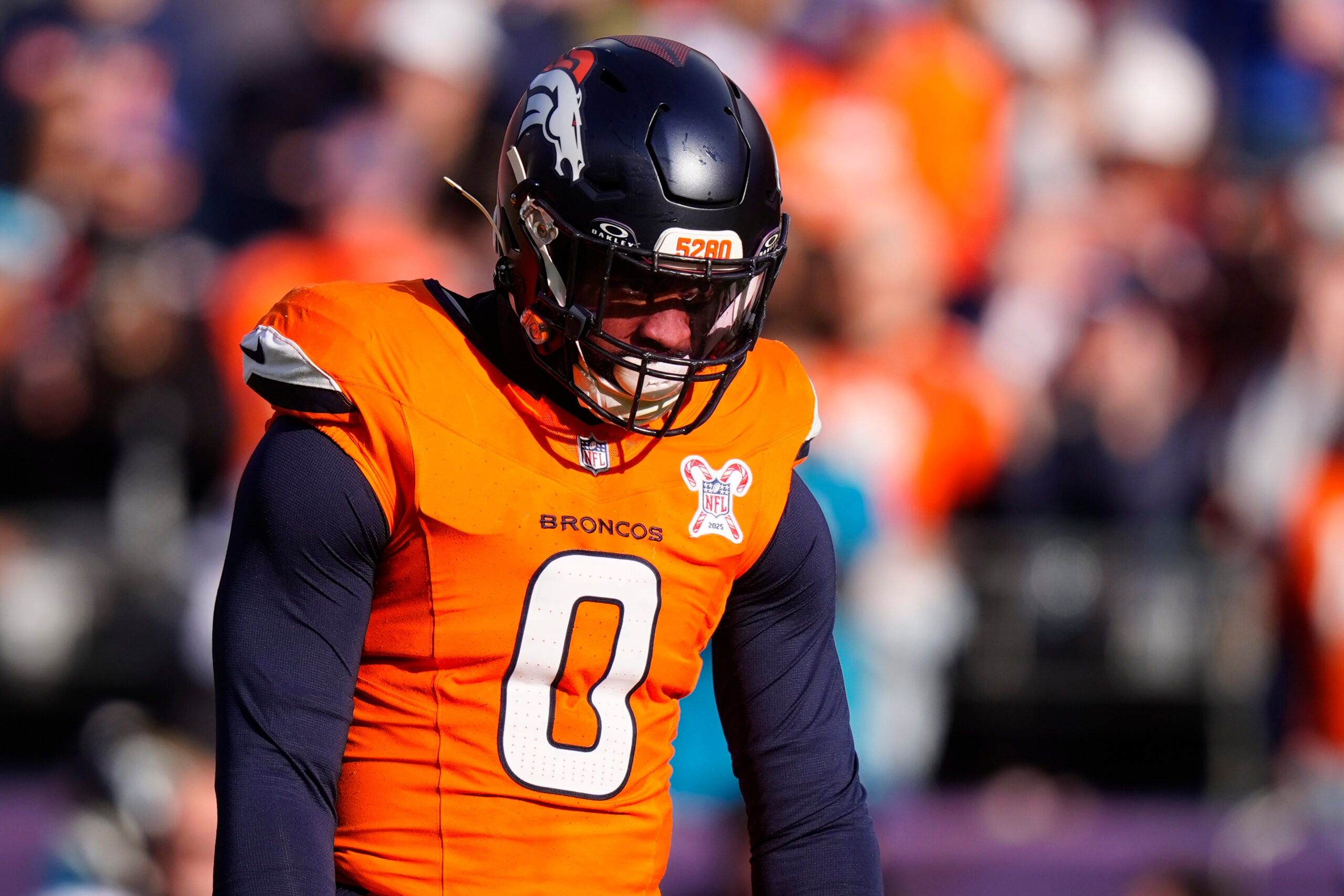 Dec 21, 2025; Denver, Colorado, USA; Denver Broncos linebacker Jonathon Cooper (0) before the game at Empower Field at Mile High.