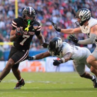Jan 1, 2026; Miami Gardens, FL, USA; Texas Tech Red Raiders tight end Terrance Carter Jr. (7) runs with the ball against the Oregon Ducks during the second half of the 2025 Orange Bowl and quarterfinal game of the College Football Playoff at Hard Rock Stadium.