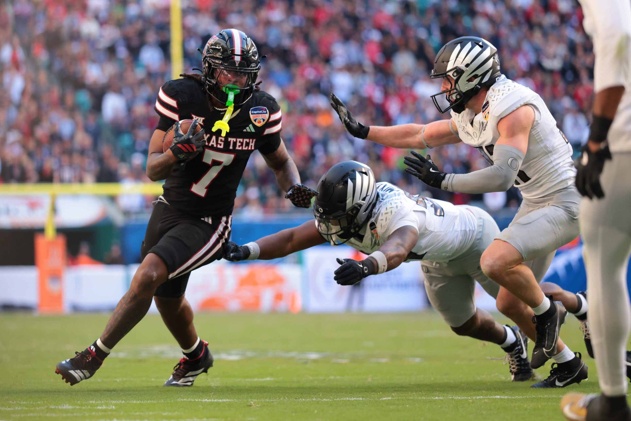 Jan 1, 2026; Miami Gardens, FL, USA; Texas Tech Red Raiders tight end Terrance Carter Jr. (7) runs with the ball against the Oregon Ducks during the second half of the 2025 Orange Bowl and quarterfinal game of the College Football Playoff at Hard Rock Stadium.