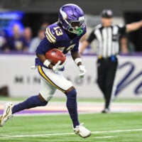 Jan 4, 2026; Minneapolis, Minnesota, USA; Minnesota Vikings wide receiver Tai Felton (13) returns the ball against the Green Bay Packers during the first quarter at U.S. Bank Stadium.