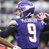 Jan 4, 2026; Minneapolis, Minnesota, USA; Minnesota Vikings quarterback J.J. McCarthy (9) throws a pass against the Green Bay Packers during the first quarter at U.S. Bank Stadium.