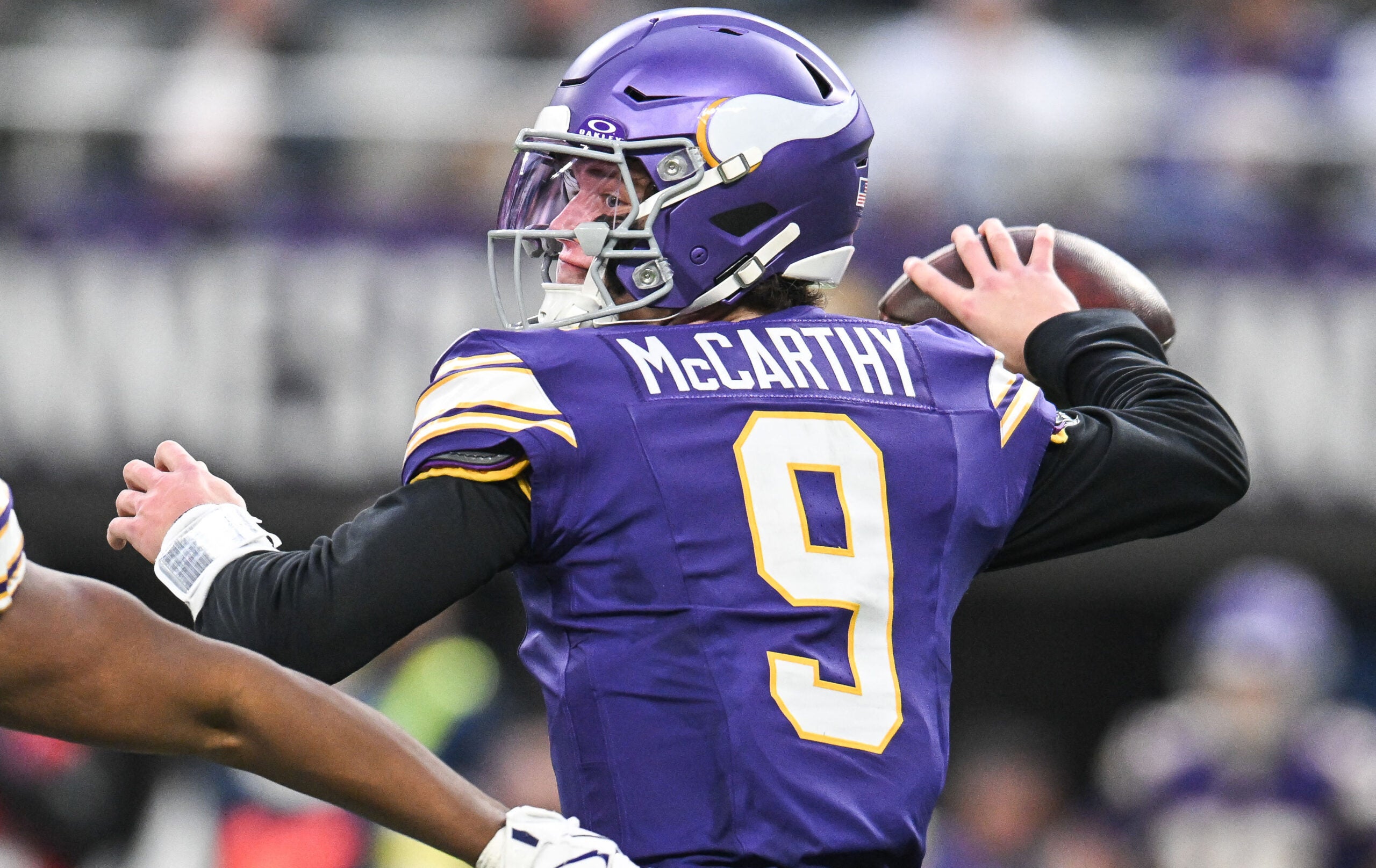 Jan 4, 2026; Minneapolis, Minnesota, USA; Minnesota Vikings quarterback J.J. McCarthy (9) throws a pass against the Green Bay Packers during the first quarter at U.S. Bank Stadium.