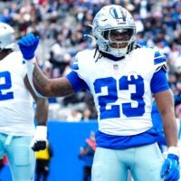 Dallas Cowboys running back Jaydon Blue (23) celebrates after scoring the first touchdown of the game, Sunday, January 4, 2026, in East Rutherford.