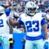 Dallas Cowboys running back Jaydon Blue (23) celebrates after scoring the first touchdown of the game, Sunday, January 4, 2026, in East Rutherford.