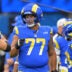 Jan 4, 2026; Inglewood, California, USA; Los Angeles Rams offensive tackle Alaric Jackson (77) on the field prior to a game against the Arizona Cardinals at SoFi Stadium.