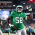Jan 4, 2026; Philadelphia, Pennsylvania, USA; Philadelphia Eagles linebacker Jalyx Hunt (58) celebrates an interception during the second quarter against the Washington Commanders at Lincoln Financial Field.
