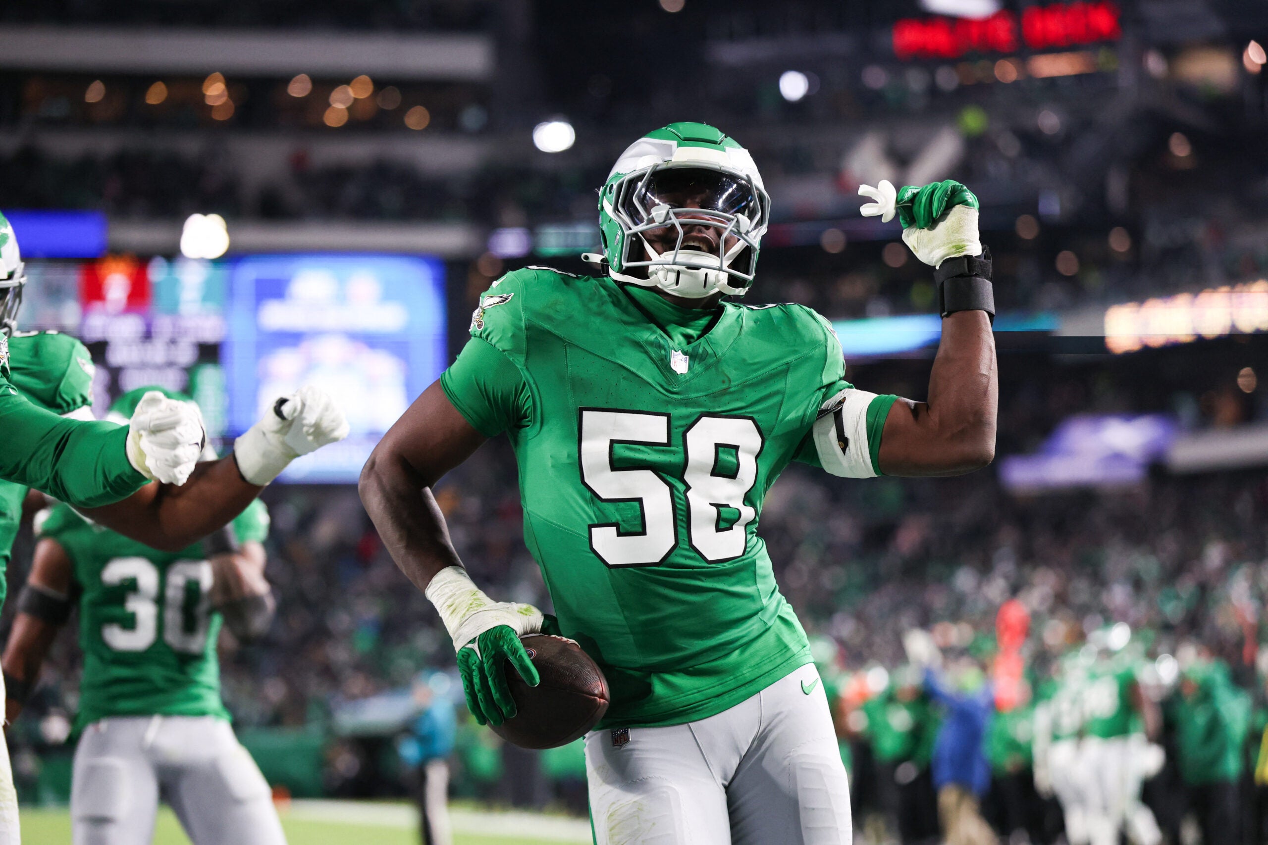 Jan 4, 2026; Philadelphia, Pennsylvania, USA; Philadelphia Eagles linebacker Jalyx Hunt (58) celebrates an interception during the second quarter against the Washington Commanders at Lincoln Financial Field.