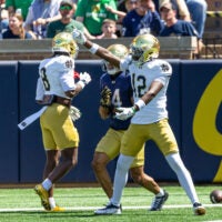 Apr 25, 2026; Notre Dame, IN, USA; Notre Dame Fighting Irish defensive back Jayden Sanders (12) celebrates breaking up a pass intended for wide receiver Bubba Frazier (4) during the Blue-Gold game at Notre Dame Stadium.