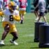 Green Bay Packers running back Josh Jacobs (8) runs through a drill during practice on Tuesday, June 2, 2026, at Ray Nitschke Field in Ashwaubenon, Wis.