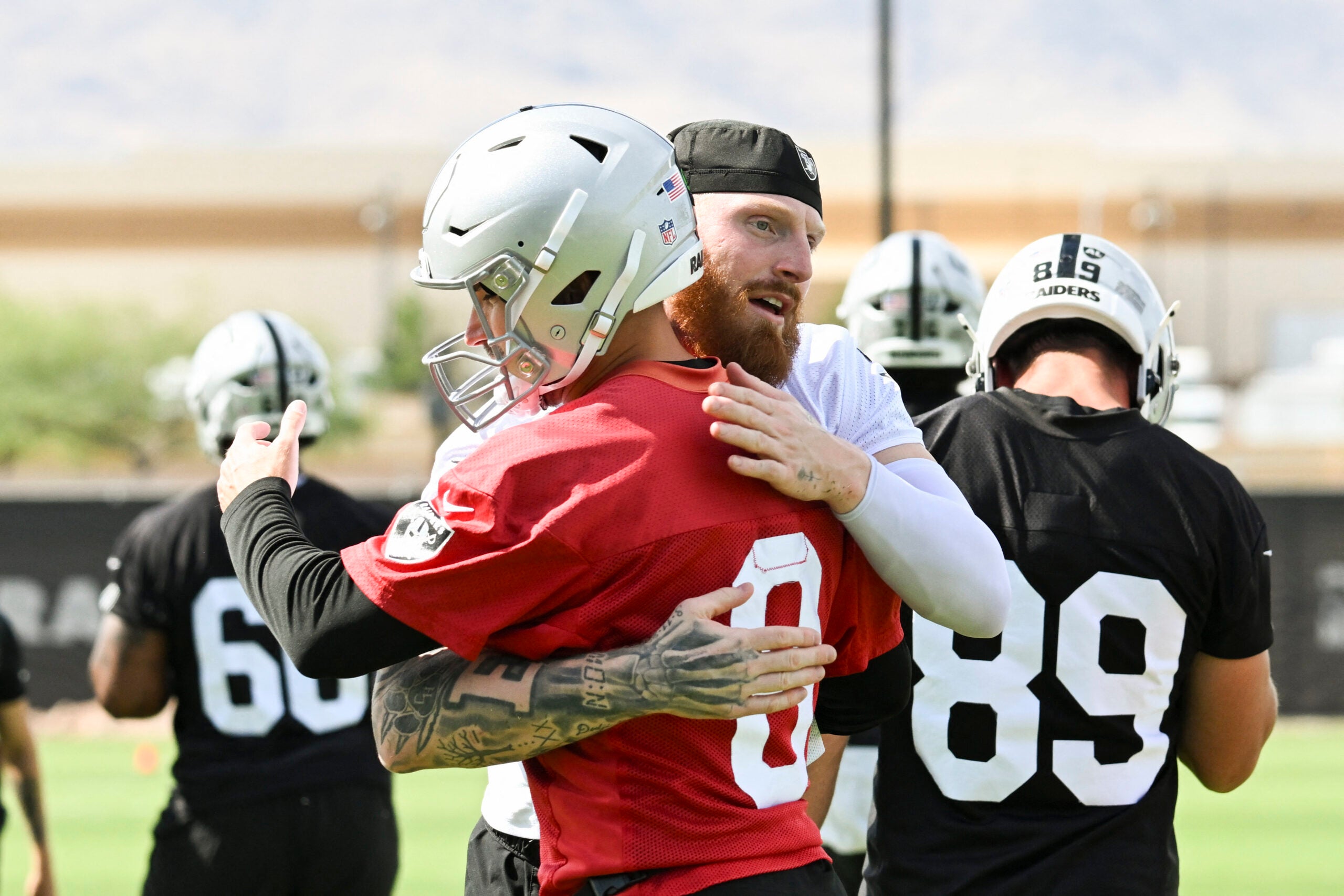 Las Vegas Raiders defensive end Maxx Crosby quarterback Kirk Cousins training camp scuffle