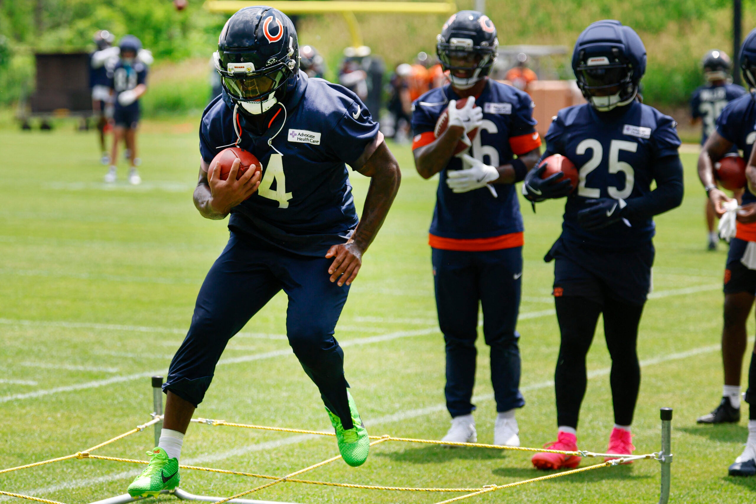 Jun 9, 2026; Lake Forest, IL, USA; Chicago Bears running back D'Andre Swift (4) runs with the ball during Chicago Bears Minicamp at Halas Hall.