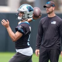 Jun 9, 2026; Charlotte, NC, USA; Carolina Panthers quarterback Bryce Young (9) throws in front of head coach Dave Canales during the first day of mini camp at Bank of America Stadium practice facility.