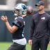 Jun 9, 2026; Charlotte, NC, USA; Carolina Panthers quarterback Bryce Young (9) throws in front of head coach Dave Canales during the first day of mini camp at Bank of America Stadium practice facility.