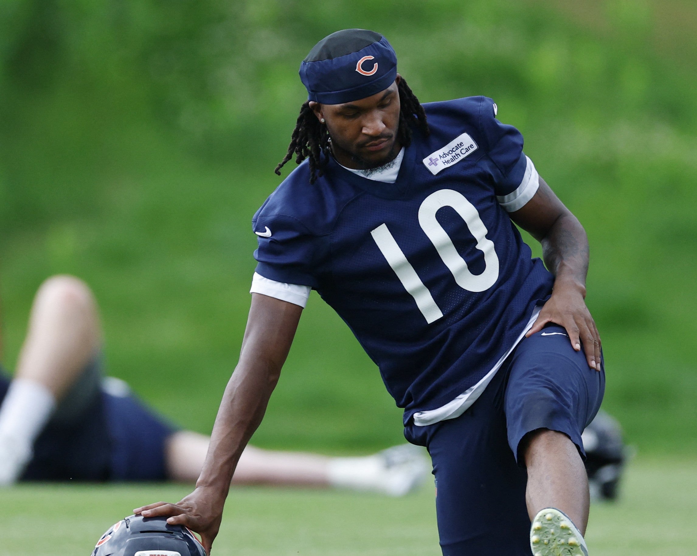 Jun 11, 2026; Lake Forest, IL, USA; Chicago Bears wide receiver Luther Burden III (10) stretches during Minicamp at Halas Hall.