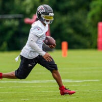 Jun 16, 2026; Atlanta, GA, USA; Atlanta Falcons running back Bijan Robinson (7) runs with the ball on the field during Minicamp.