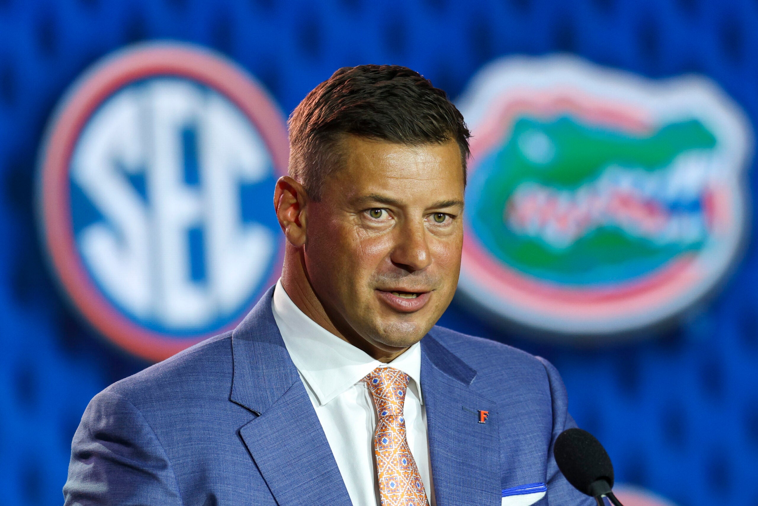 Jul 22, 2026; Tampa, FL, USA; Florida Gators head coach Jon Sumrall speaks to the press during SEC Football Kickoff Media Day at the Tampa Marriott.
