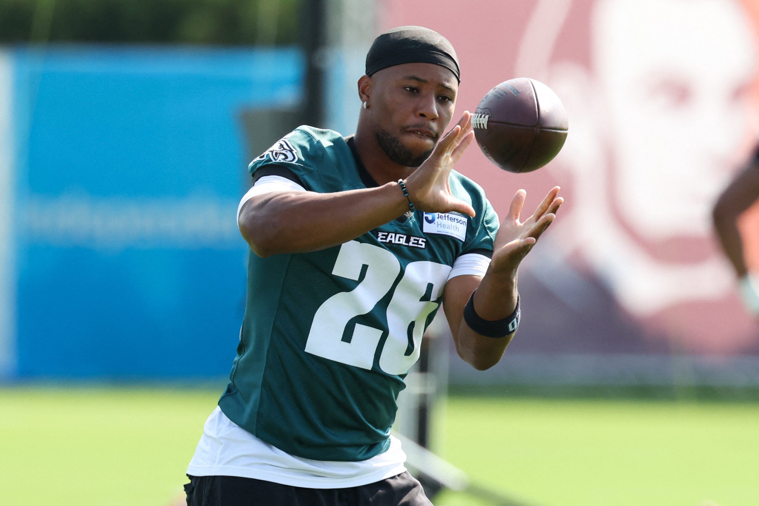 Jul 29, 2026; Philadelphia, PA, USA; Philadelphia Eagles running back Saquon Barkley (26) catches a ball during training camp at Jefferson Health Training Complex.