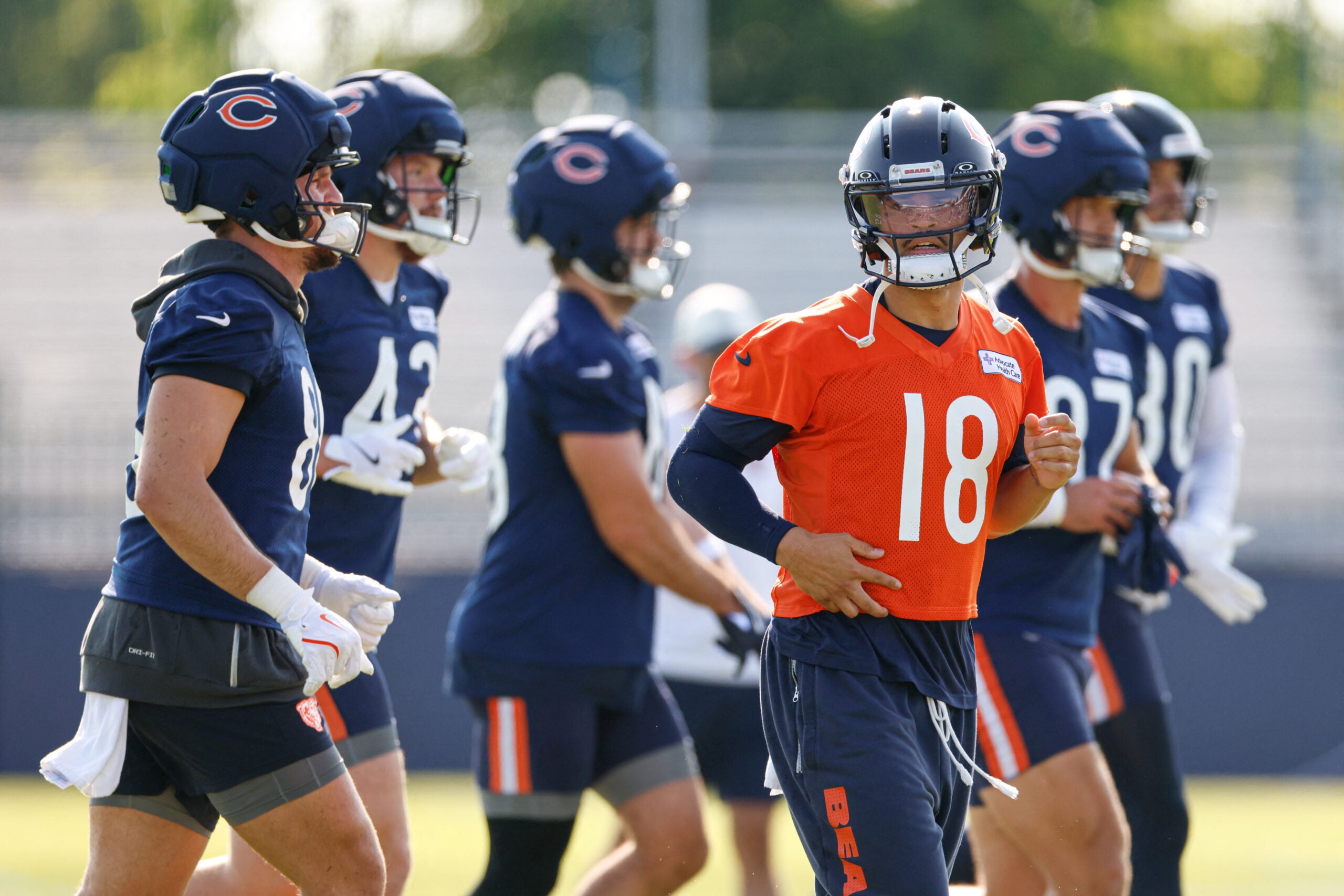 Jul 29, 2026; Lake Forest, IL, USA; Chicago Bears quarterback Caleb Williams (18) runs on the field during Training Camp at Halas Hall.