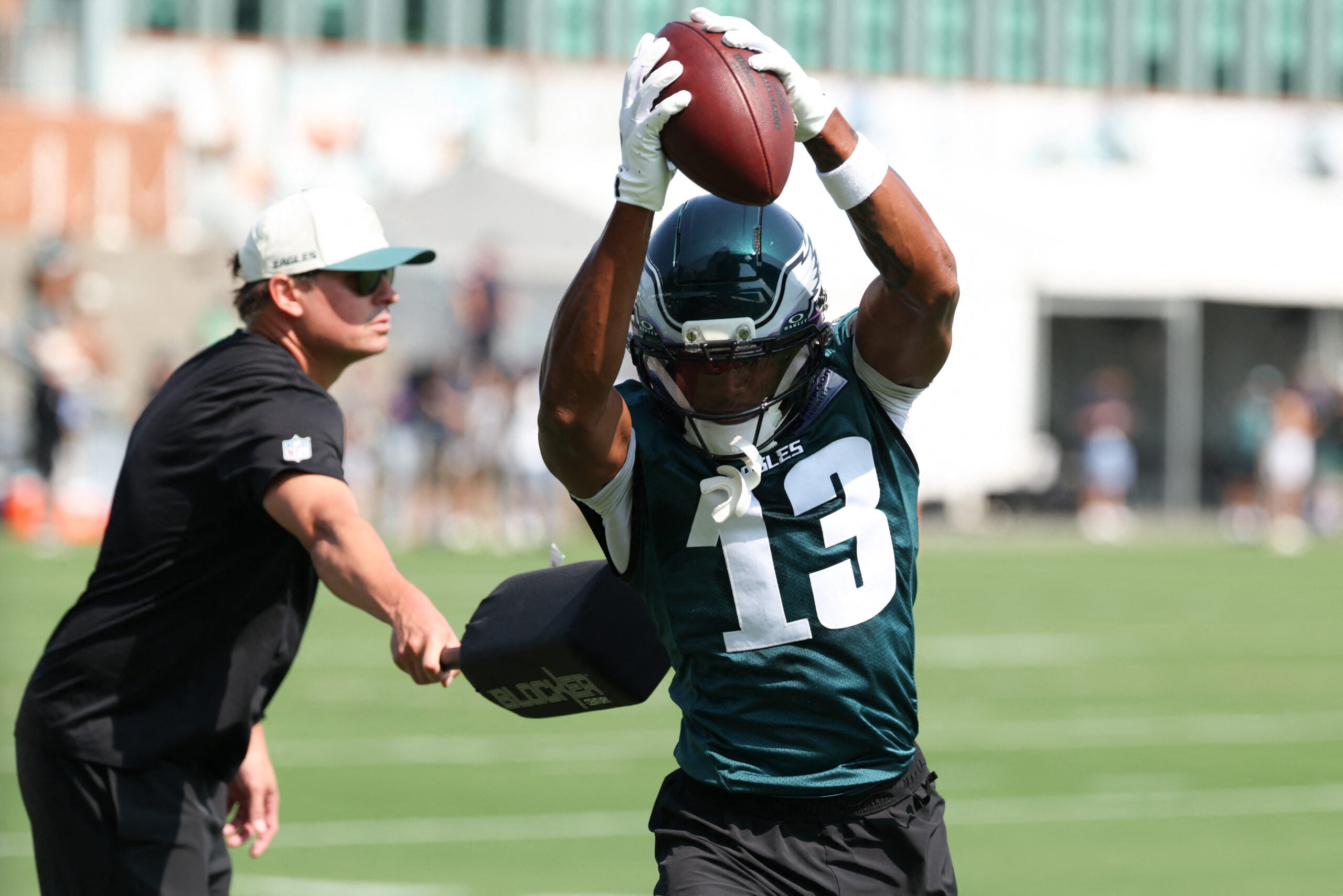 Jul 29, 2026; Philadelphia, PA, USA; Philadelphia Eagles wide receiver Dontayvion Wicks (13) catches a pass during training camp at Jefferson Health Training Complex.