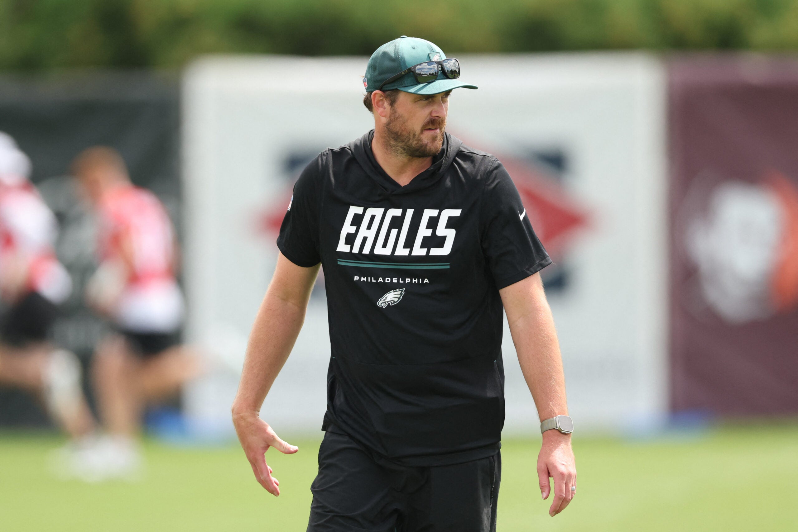 Jul 30, 2026; Philadelphia, PA, USA; Philadelphia Eagles offensive coordinator Sean Mannion looks on during training camp at Jefferson Health Training Complex.