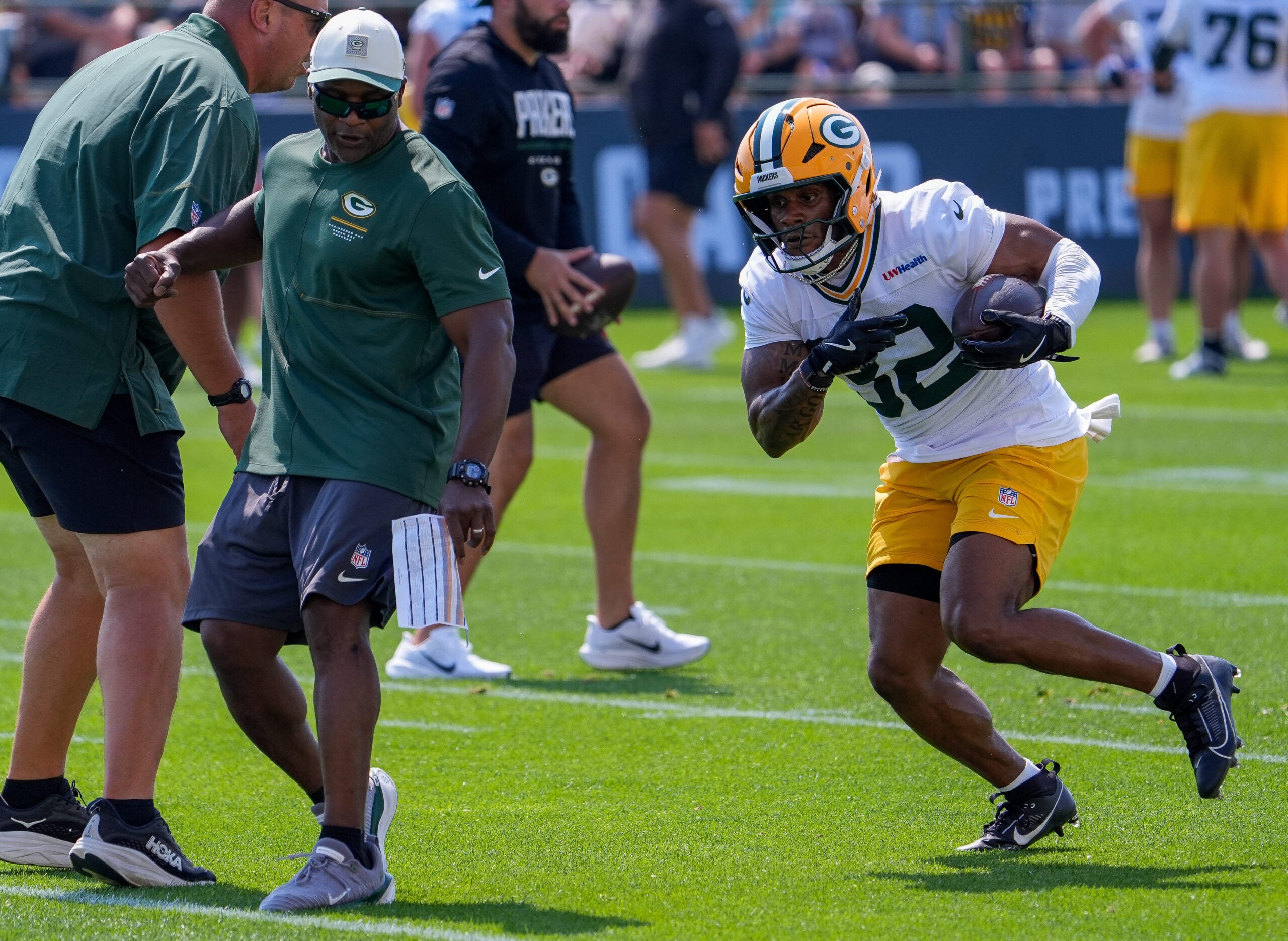 Green Bay Packers running back MarShawn Lloyd (32) runs through a drill during the second day of training camp Thursday, July 30, 2026, at the Don Hutson Center in Ashwaubenon, Wisconsin.