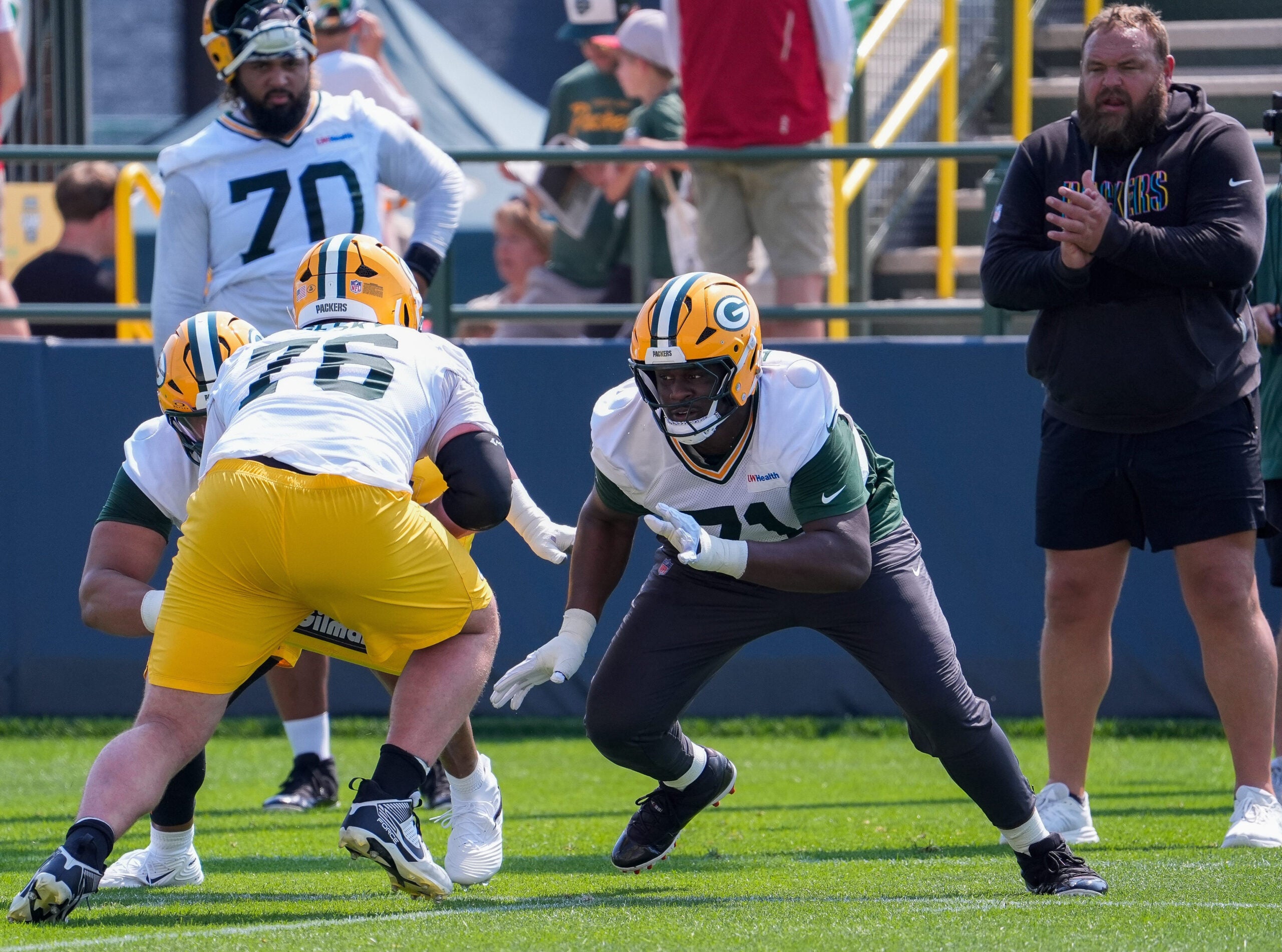 Green Bay Packers offensive linemen Josh Gesky (76) and Anthony Belton (71) run through a drill during the second day of training camp Thursday, July 30, 2026, at the Don Hutson Center in Ashwaubenon, Wisconsin.