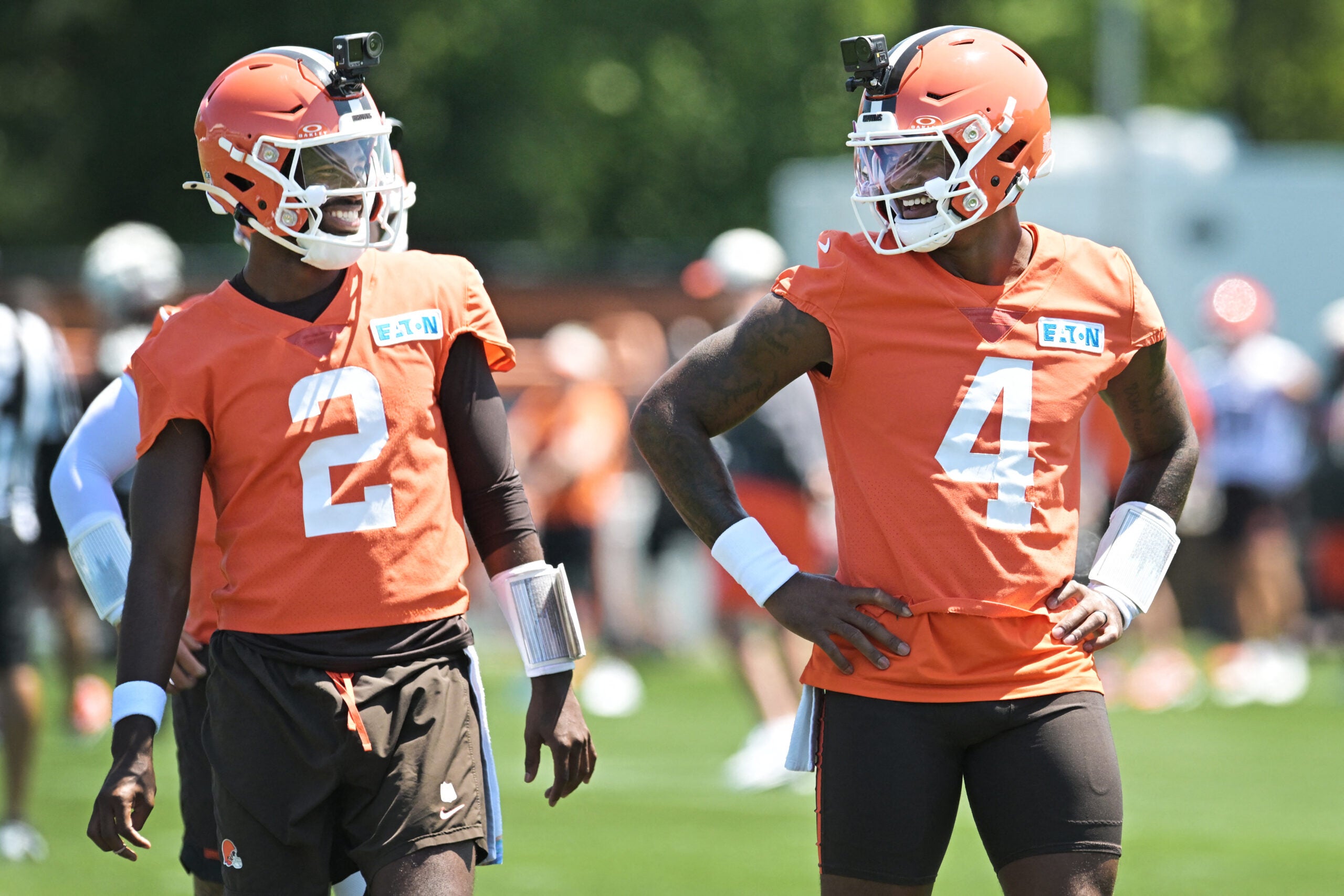 Jul 30, 2026; Berea, OH, USA; Cleveland Browns quarterback Shedeur Sanders (2) and quarterback Deshaun Watson (4) talk during training camp at CrossCountry Mortgage Campus.