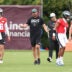 Jul 30, 2026; Philadelphia, PA, USA; Philadelphia Eagles offensive coordinator Sean Mannion and quarterbacks Jalen Hurts (1) and Andy Dalton (14) and Cole Payton (10) and Tanner McKee (16) during training camp at Jefferson Health Training Complex.