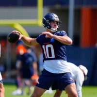Jul 31, 2026; Englewood, CO, USA; Denver Broncos quarterback Bo Nix (10) prepares to pass the ball during training camp at Broncos Park.