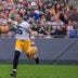 Green Bay Packers tight end Tucker Kraft (85) hypes up the crowd during practice on Friday, July 31, 2026, at Ray Nitschke Field in Ashwaubenon, Wisconsin.