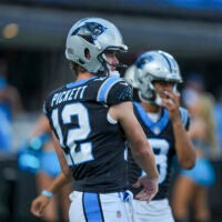 Jul 31, 2026; Charlotte, NC, USA; Carolina Panthers quarterback Kenny Pickett throws with Carolina Panthers quarterback Haynes King (16) during Fanfest at Bank of America Stadium.