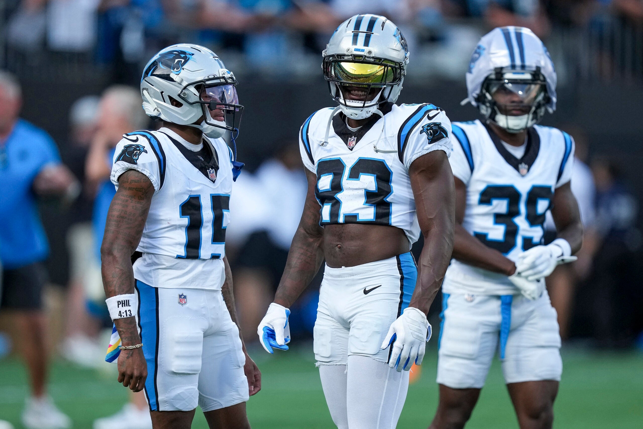 Jul 31, 2026; Charlotte, NC, USA; Carolina Panthers wide receiver Jimmy Horn Jr. (15) and wide receiver David Moore (83) chat during Fanfest at Bank of America Stadium.