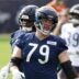 Jul 31, 2026; Lake Forest, IL, USA; Chicago Bears offensive tackle Theo Benedet (79) and offensive tackle Kiran Amegadjie (72) warm up during Training Camp at Halas Hall.