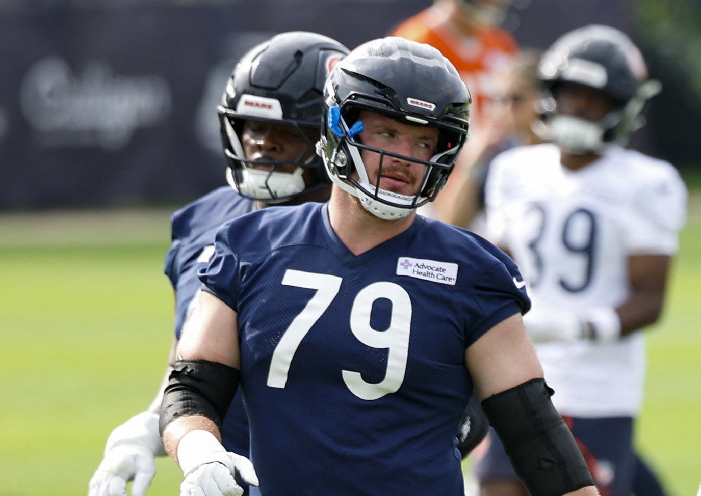 Jul 31, 2026; Lake Forest, IL, USA; Chicago Bears offensive tackle Theo Benedet (79) and offensive tackle Kiran Amegadjie (72) warm up during Training Camp at Halas Hall.