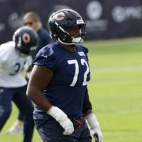 Jul 31, 2026; Lake Forest, IL, USA; Chicago Bears offensive tackle Kiran Amegadjie (72) warms up during Training Camp at Halas Hall.