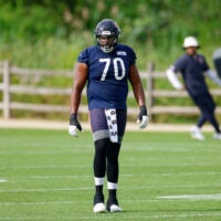 Jul 31, 2026; Lake Forest, IL, USA; Chicago Bears offensive tackle Braxton Jones (70) walks on the field during Training Camp at Halas Hall.