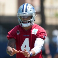 Aug 1, 2026; Oxnard, CA, USA; Dallas Cowboys quarterback Dak Prescott (4) takes the snap at training camp at River Ridge Playing Fields.